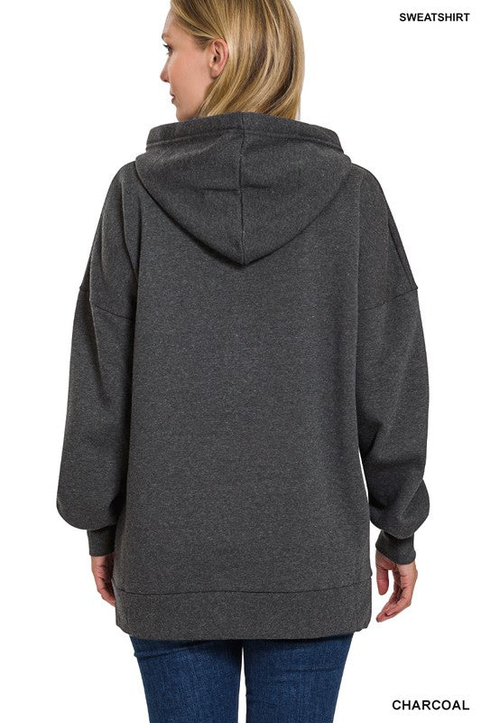 Oversized hoodie sweatshirt with kangaroo front pocket and cream drawstrings. Shown in charcoal