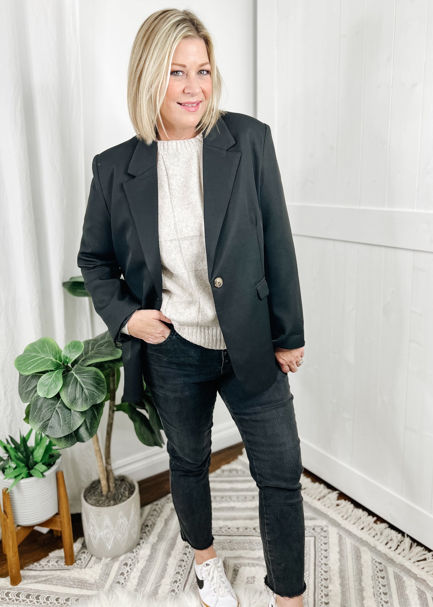 Oatmeal color sweater in a windowpane knit with long sleeves. Shown with our oversized blazer.