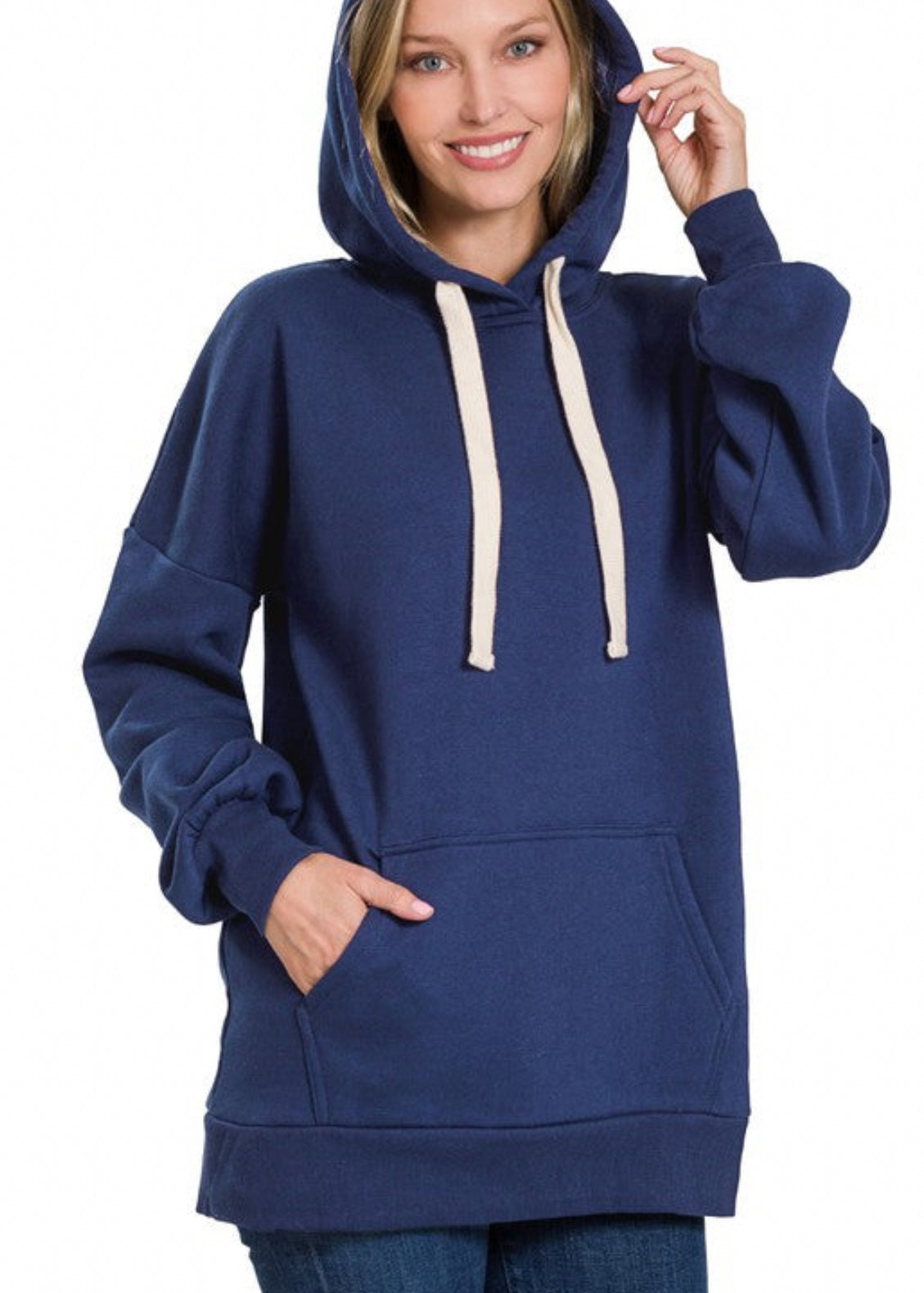 Oversized hoodie sweatshirt with kangaroo front pocket and cream drawstrings. Shown in navy