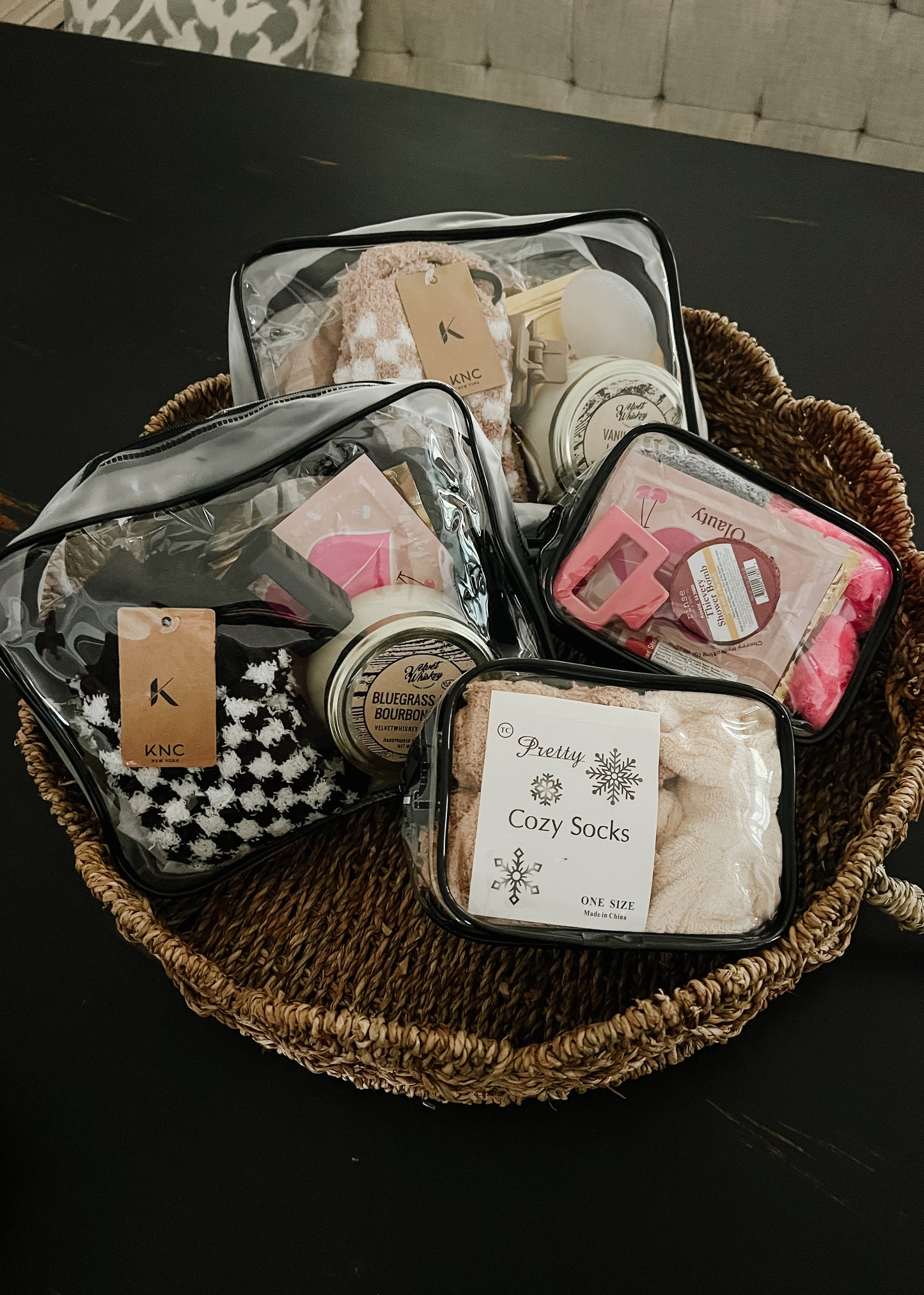 Self care gift bags. large bags includes: lear bag 9.44x7.09x2.75, spa headband, fuzzy socks, shower steamer, chapstick, hair clip, lip mask, eye mask, facial scrubbing pad, silk eye mask and soy candle. Small bag includes: clear bag 4.13x5.9x2.75, bow spa headband, fuzzy socks, shower steamer, chapstick, hair clip, lip mask, eye mask. Colors vary.