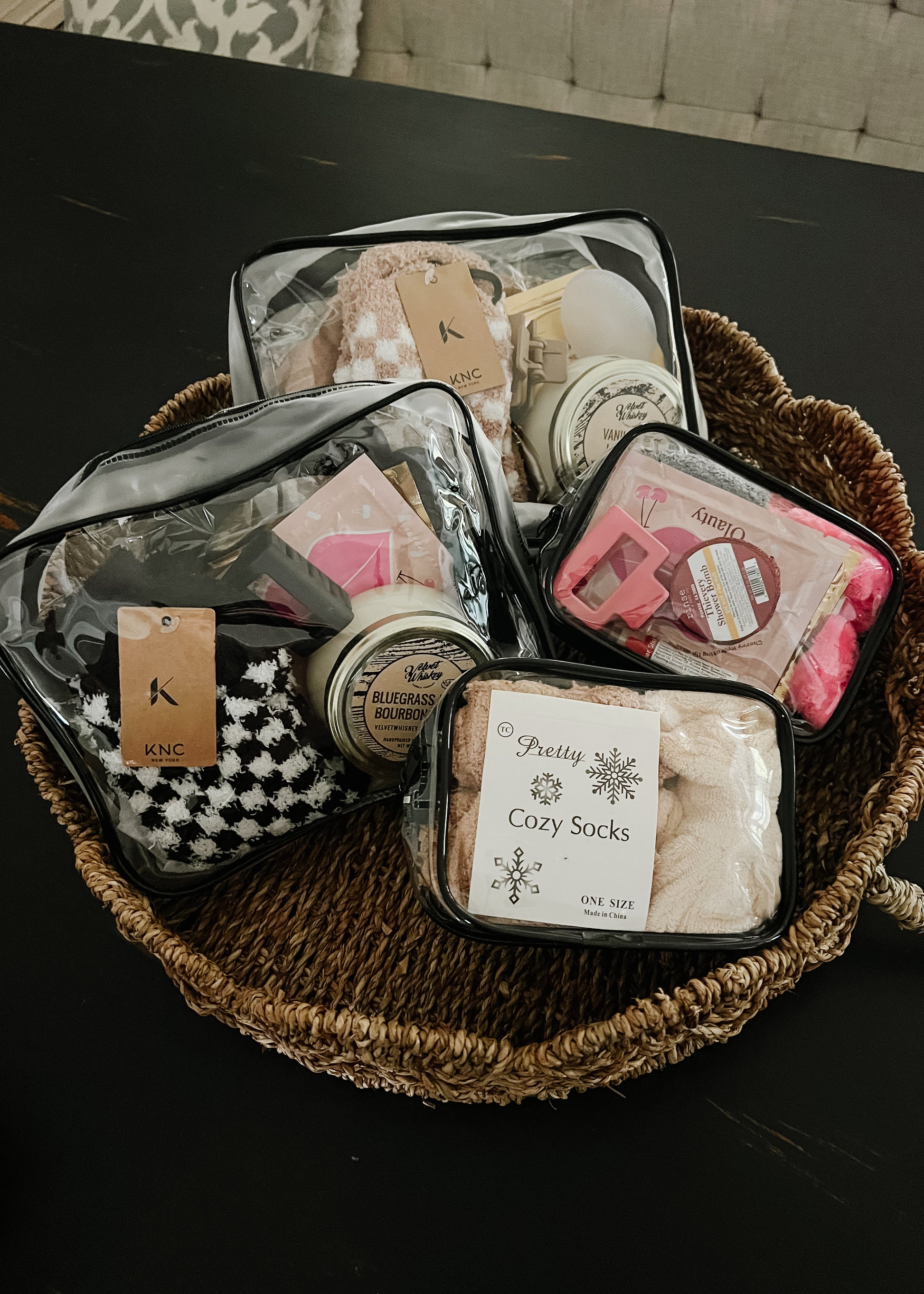 Self care gift bags. large bags includes: lear bag 9.44x7.09x2.75, spa headband, fuzzy socks, shower steamer, chapstick, hair clip, lip mask, eye mask, facial scrubbing pad, silk eye mask and soy candle. Small bag includes: clear bag 4.13x5.9x2.75, bow spa  headband, fuzzy socks, shower steamer, chapstick, hair clip, lip mask, eye mask. Colors vary.