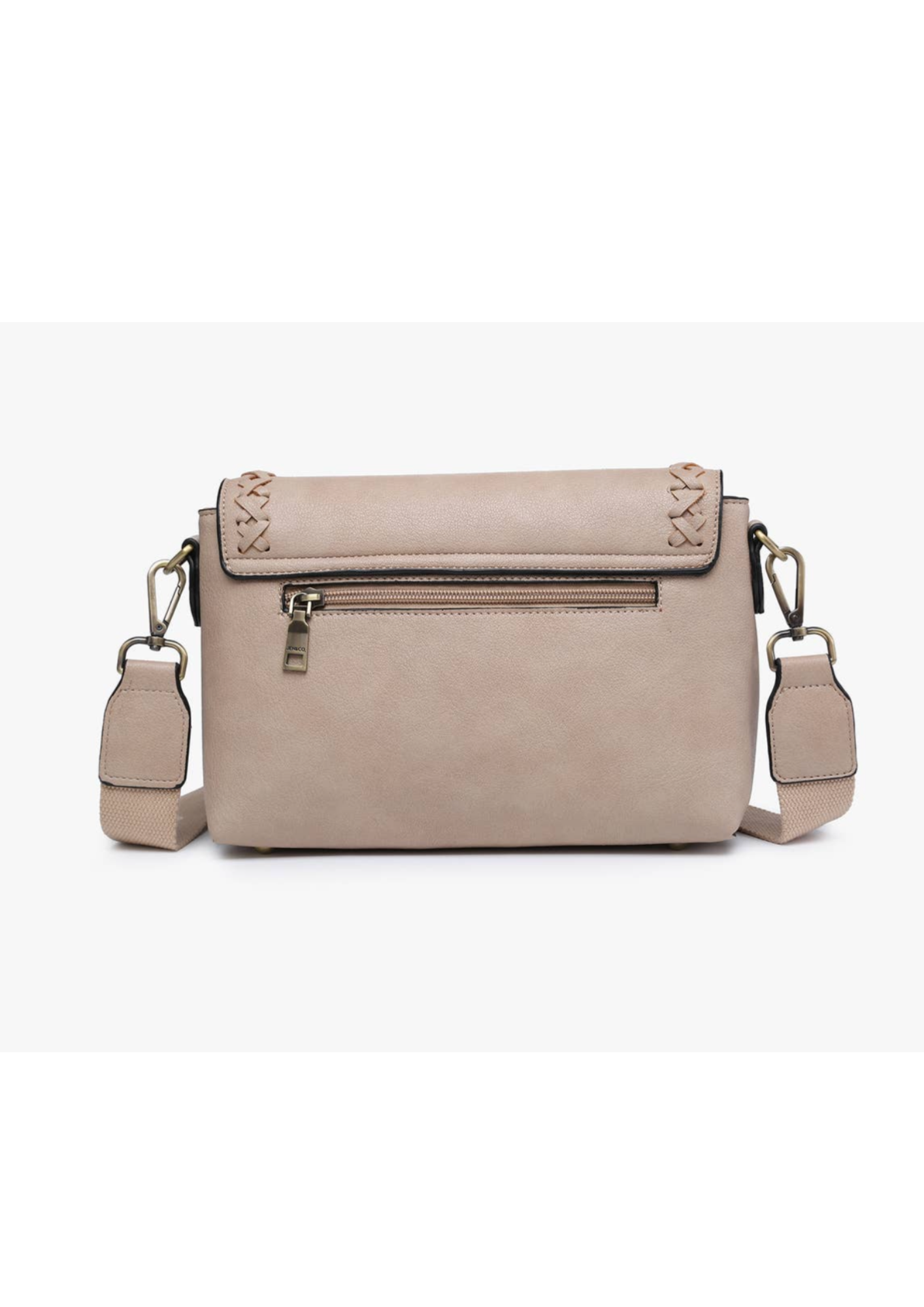Vegan leather purse on beige with front flap over and stitch details. Flap has a magnetic closure and back has a zipper pocket. Strap is adjustable and can be used as a crossbody or shoulder bag.