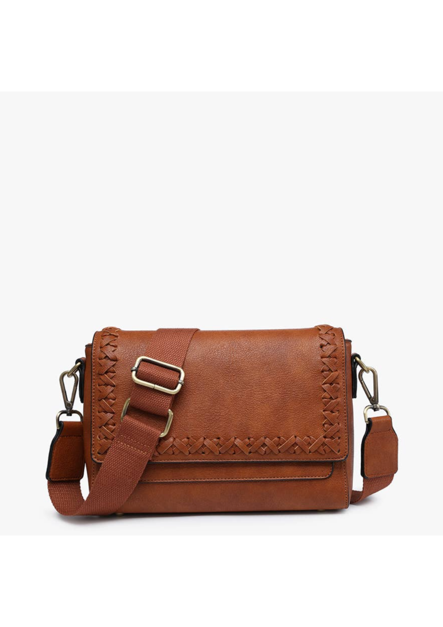 Vegan leather purse on brown with front flap over and stitch details. Flap has a magnetic closure and back has a zipper pocket. Strap is adjustable and can be used as a crossbody or shoulder bag.