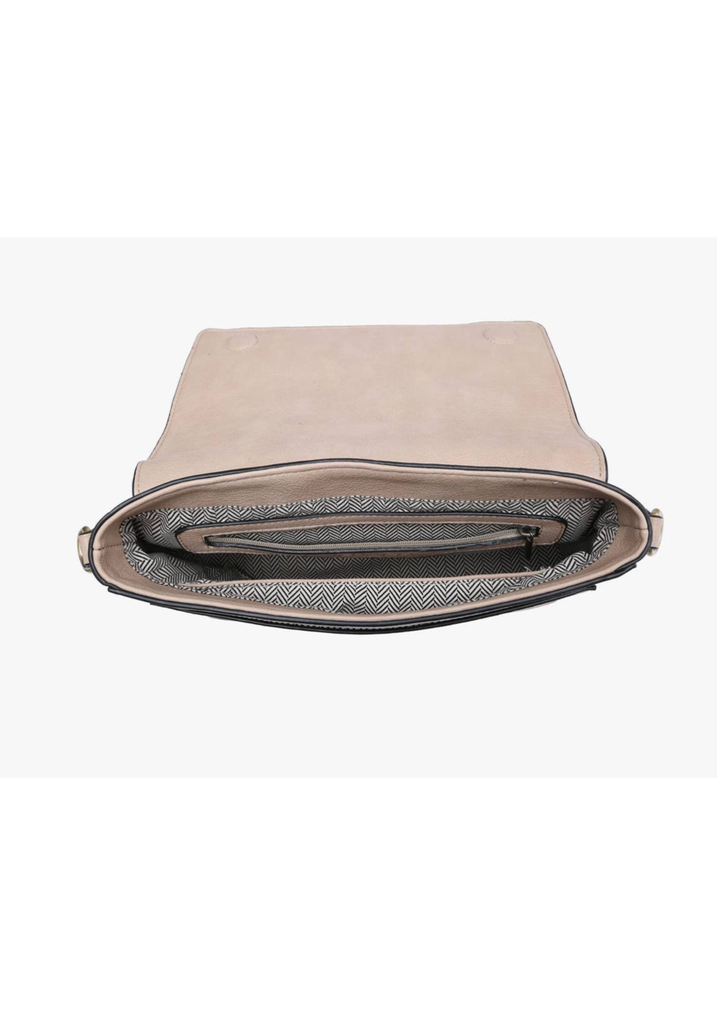 Vegan leather purse on beige with front flap over and stitch details. Flap has a magnetic closure and back has a zipper pocket. Strap is adjustable and can be used as a crossbody or shoulder bag.