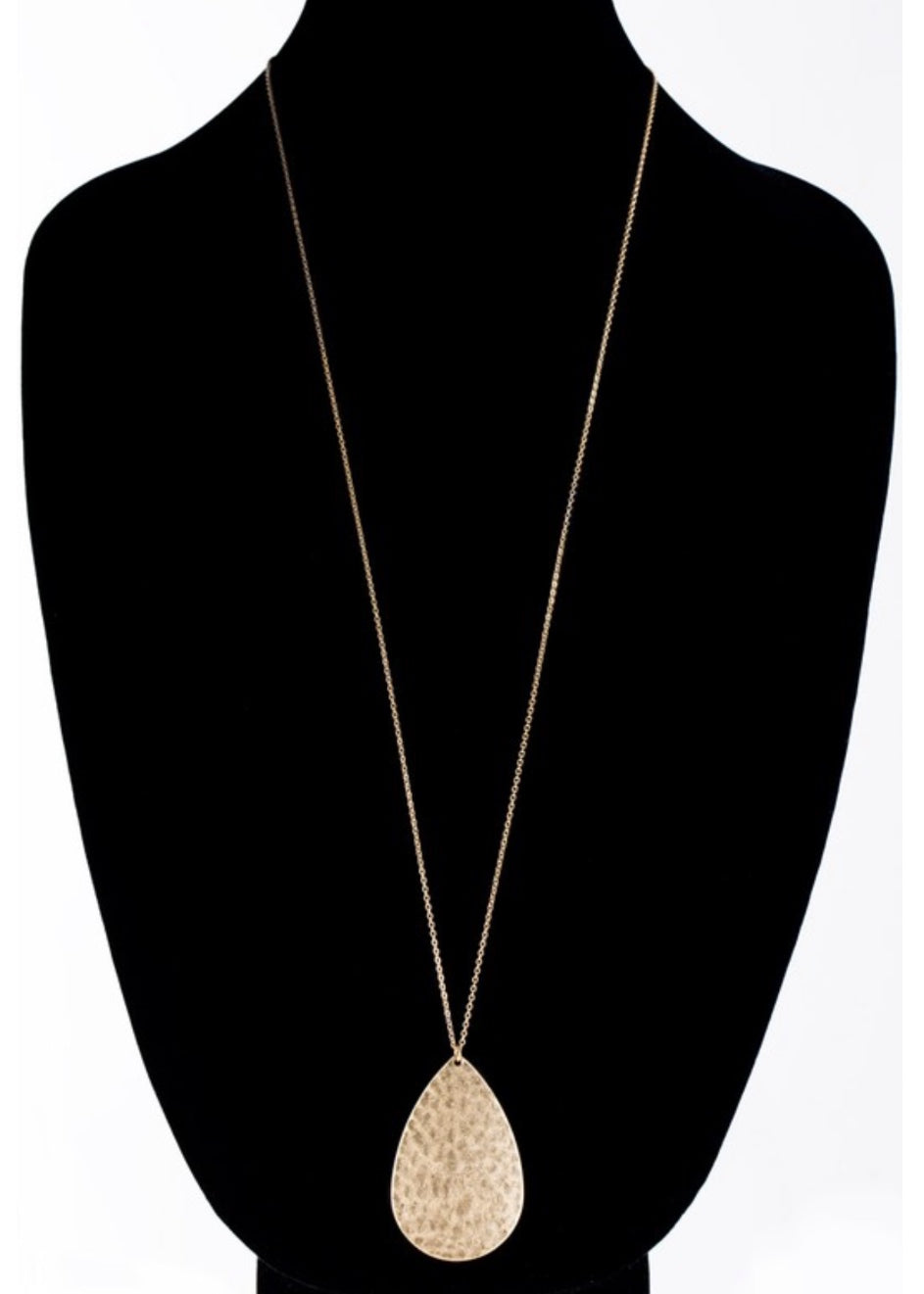 Gold teardrop necklace.