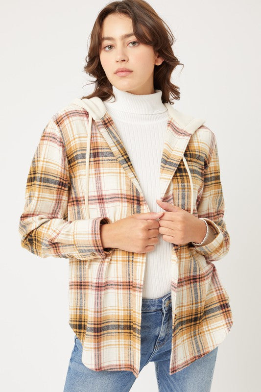 Plaid flannel hoodie button up wit front pockets and funcional drawstring on hoodie. Flannel is a cream base with black, terracotta and saffron plaid.  