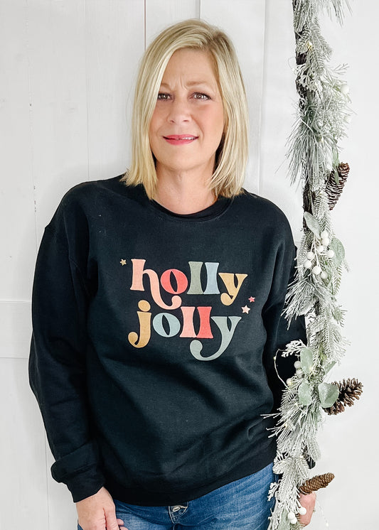 Black Holly Jolly sweatshirt. Holly jolly in multi color with 3 small stars. 
