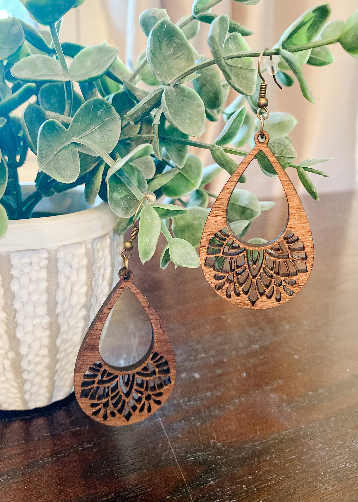 Wood Mandala Teardrop Earrings with gold hardware.