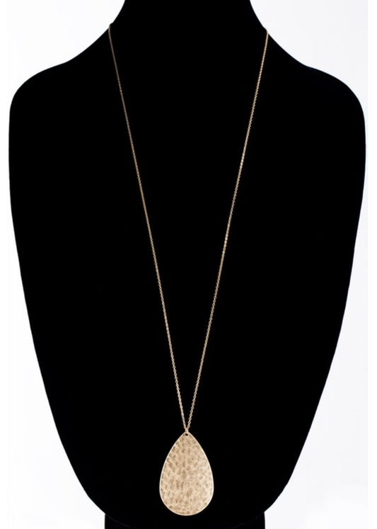 Gold teardrop necklace.